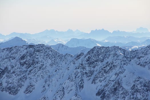 Winter alpine mountains covered with snow