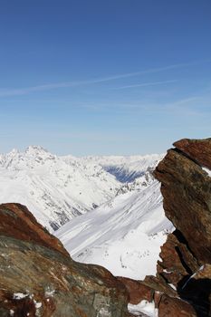 Winter alpine mountains covered with snow