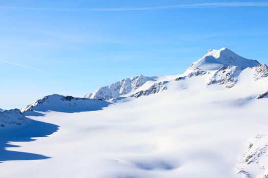 Hight mountains under blue sky beautiful winter panorama