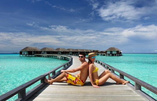 Couple on a tropical beach at Maldives