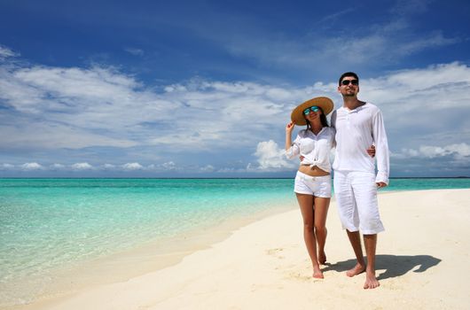 Couple on a tropical beach at Maldives