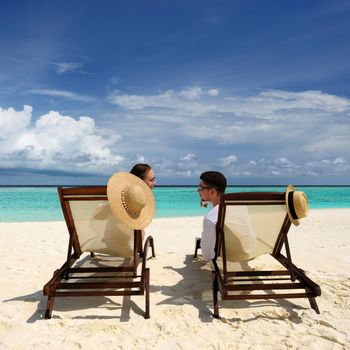 Couple on a tropical beach at Maldives