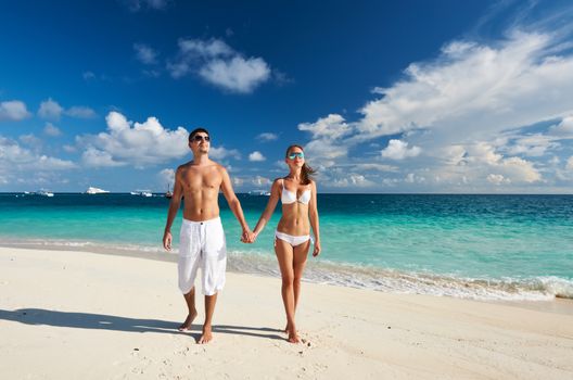 Couple on a tropical beach at Maldives