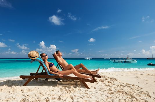 Couple on a tropical beach at Maldives