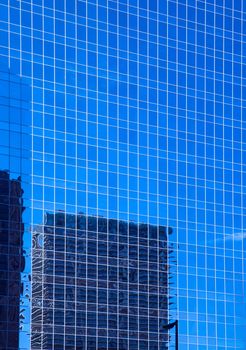 Downtown Houston in Texas cityscape mirror blue skyscrapers details