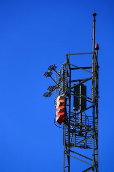 mobile phone antenna on the hill of city with city view