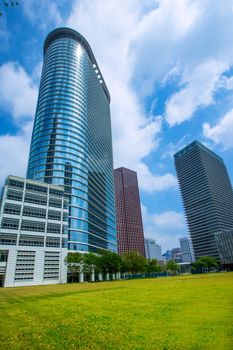 Houston downtown skyscrapers disctict with mirror blue sky reflection