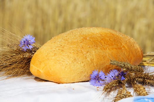 Bread and wheat outdoors natural healthy food concept