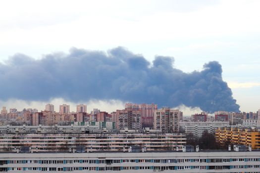 Dangerous Smoke over city at evening time