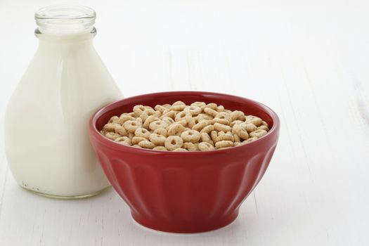 Delicious and nutritious lightly toasted honey, nuts and oats cereal with milk.