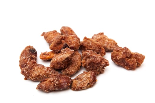 caramelized almonds on a white background