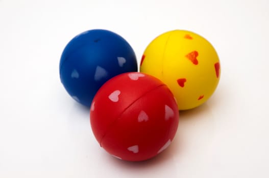 colored balls on a white background