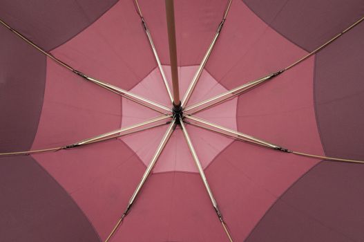 bottom of a multicolored umbrella lilac