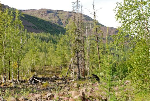 Mountains rise along the river, which is difficult to climb