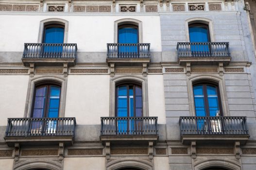 very large building with small balconies in Barcelona
