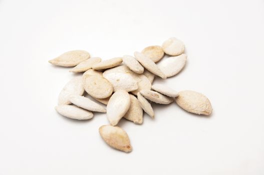 pumpkin seeds on a white background