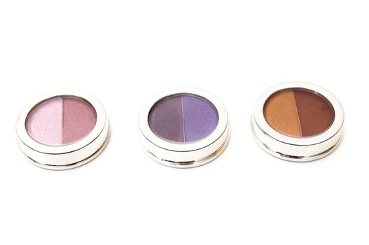 stains of different colors on a white background