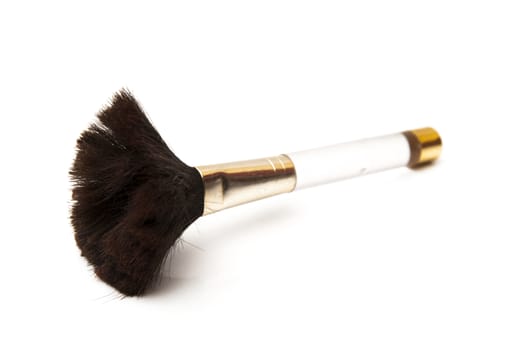 makeup brush on a white background