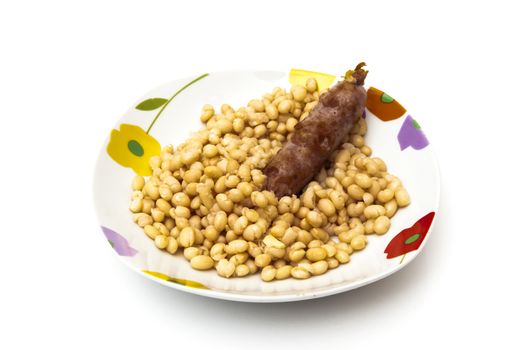 monchetas dish with sausage on a white background