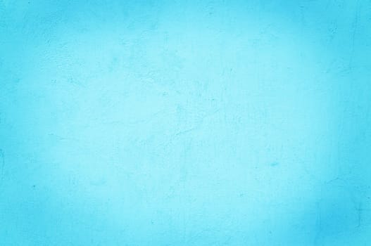 Aqua color on a solid stone wall as background texture.