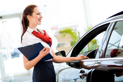 portrait of a young woman in a showroom consultant