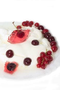curd with  currant, cherry on  plate isolated white backgrownd 