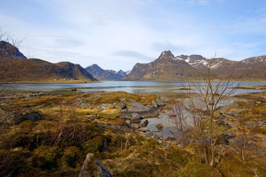 Snowcapped mountains and blue water, Norwegian fjord