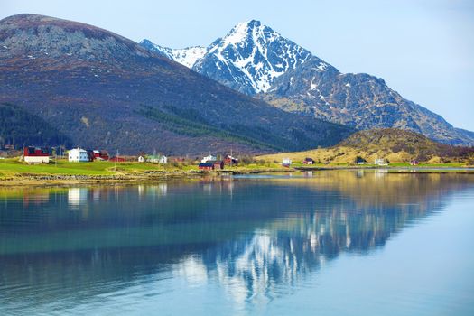 Snowcapped mountains and blue water, Norwegian fjord