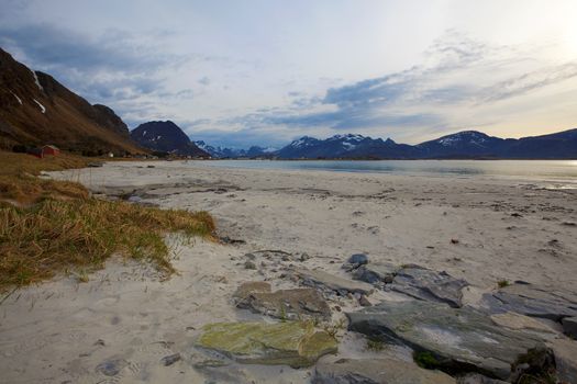 Snowcapped mountains and blue water, Norwegian fjord