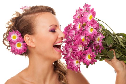 Beautiful young caucasian woman with flowers in her hair isolated over white background