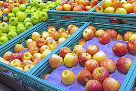 Diversity of red and green apples in the supermarket