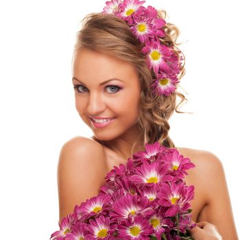 Beautiful young caucasian woman with flowers in her hair isolated over white background