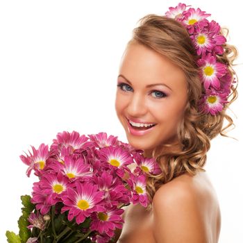 Beautiful young caucasian woman with flowers in her hair isolated over white background