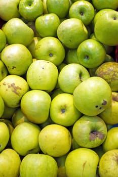 Organic apples in the market stall
