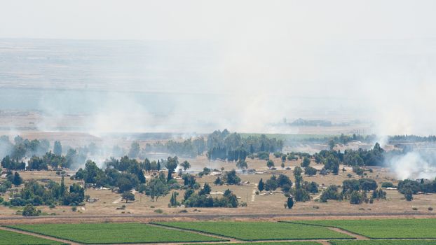 JUNE 06: Artillery fire in Syrian city Al Qunaytirah on Golan Heights 
on June 06, 2013 in Syria