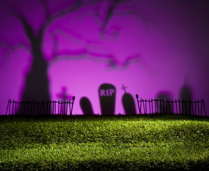 Halloween colorful landscape with tree and graveyard