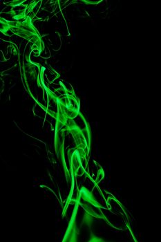 green smoke in black backgroun