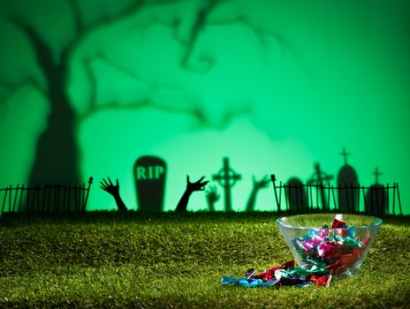 Halloween landscape with tree graveyard and sweets