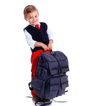 Happy schoolboy with backpack isolated on white background
