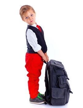 Happy schoolboy with backpack isolated on white background