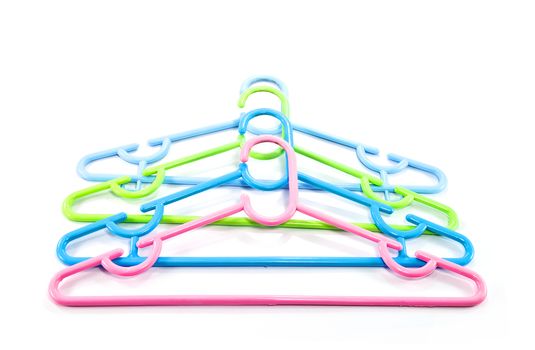 Colorful hangers isolated on white background.