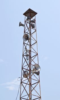 Speaker on high tower and blue sky