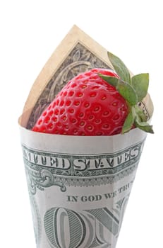 strawberry wrapped in one dollar banknote