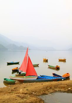 Boats on Phewa lake in Pokhara, Nepal 