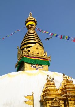 Stupa of the swayambhunath temple with blue sky in kathmandu, Nepal 