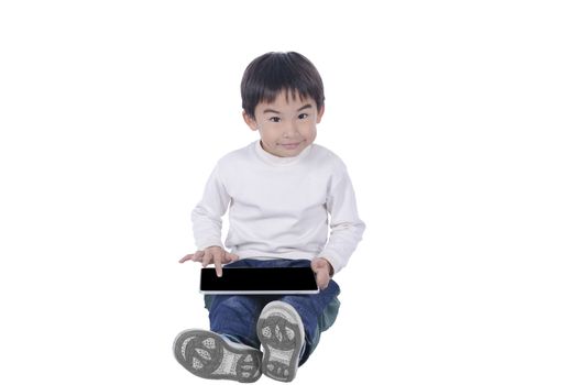 Cute boy loves his touchpad with white background
