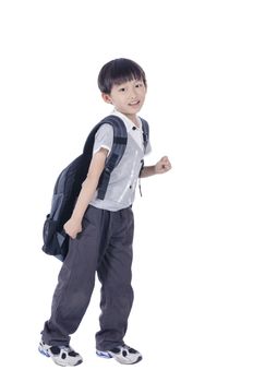 Happy smart boy ready for school over white background