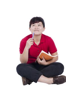 Attractive asian student thinking and smiling on white background