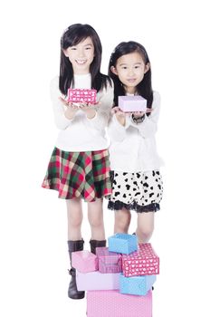 Two pretty girls get gifts on white background