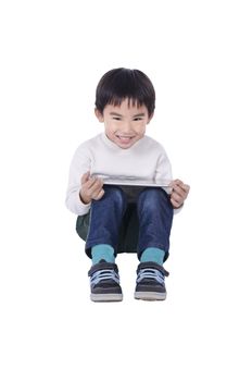 Cute boy loves his touchpad with white background
